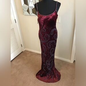 Burgundy color dress with beautiful designs